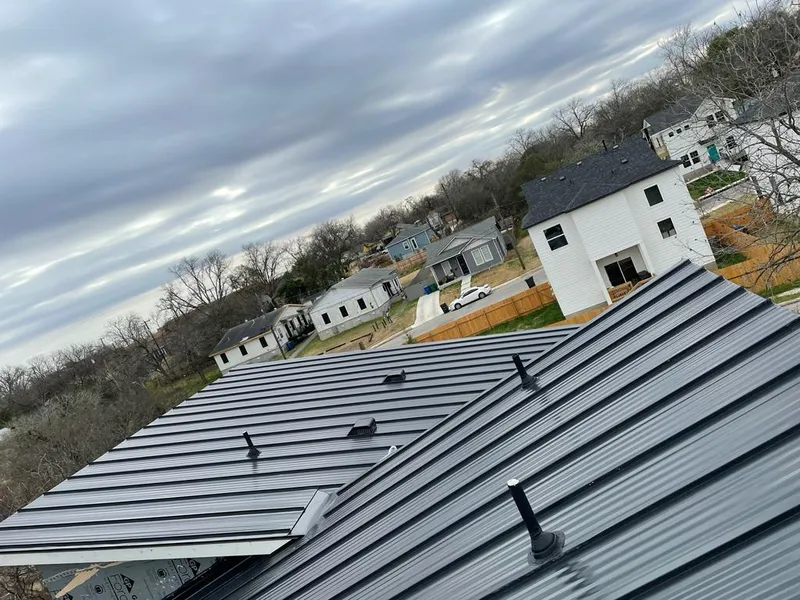 Standing seam metal roof panels with vents for Skylight Repair in Great Falls